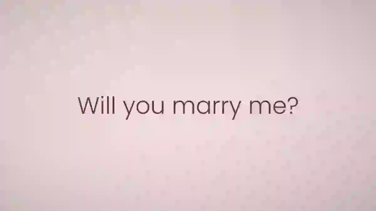 연한 분홍 빈 바탕 가운데에 「Will you marry me?」 한 줄만 적힌 프로포즈 영상 마지막 화면
